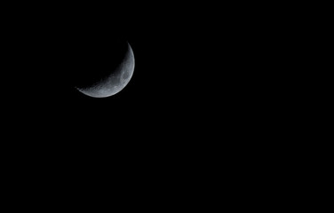 Obraz na płótnie Canvas beautiful Mystical half moon on dark Night sky background with copy space