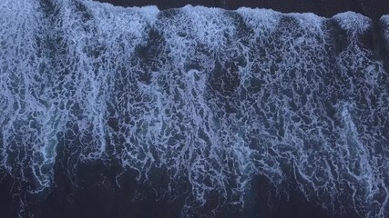 Aerial: Above the ocean, aerial view at the waves and surface, fly cam move  above waves
