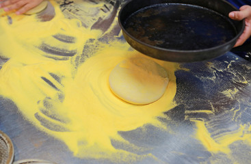 Pizza prepare dough process on table.