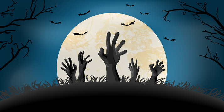 Halloween zombie hand in front of full moon