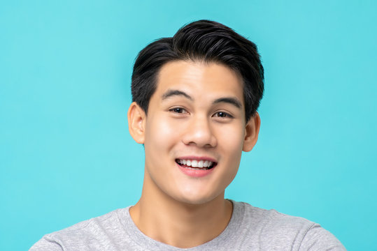 Portrait Of Cheerful Young Asian Man