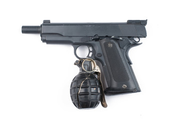 Obraz premium Gun and bomb isolated on white background.Pistol isolated