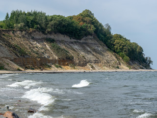 the steep bank, sandstone outcrops in the shallow Baltic Sea coast, Zelenogradsk, Russia