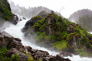 Naklejka na ściany i meble Latefoss waterfall in rainy weather, Norway