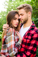 Fototapeta premium Love language. family weekend. romantic date. man and woman in checkered shirt relax in park. hipster couple outdoor. valentines day. summer camping in forest. couple in love. Hiking