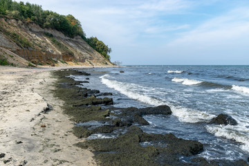 the steep bank, sandstone outcrops in the shallow Baltic Sea coast, Zelenogradsk, Russia