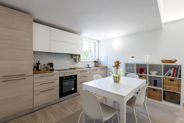 Very nice kitchen with design table and chairs