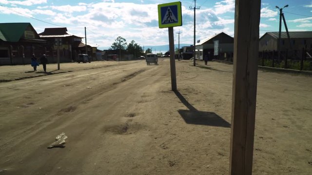Van driving in a village on Olkhon Island in Lake Bikal, Russia.