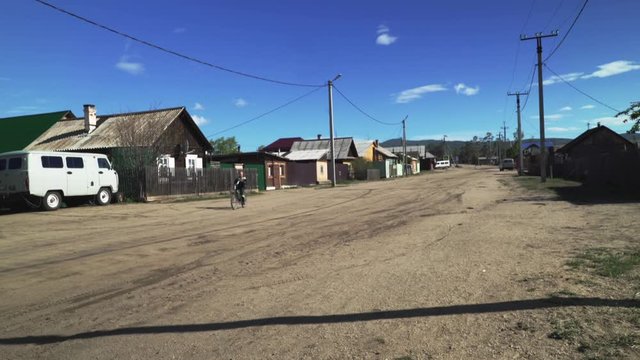 Bicycle riding in a village on Olkhon Island in Lake Bikal, Russia.