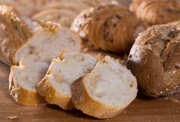 slices of wheaten bread on wooden surface