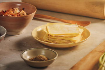 Hong Kong style Wonton ingredients: shrimp, ground pork and wonton wrappers at kitchen