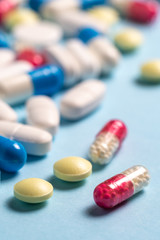 Studio shot of medical pills on blue background
