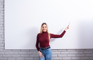 Portrait Of Happy Young Businesswoman woman near on white wall