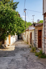 Fototapeta na wymiar Traditional Ankara houses around the alley