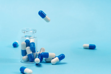 Studio shot of medical pills on blue background