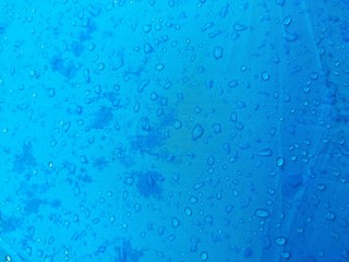 water drops on blue surface