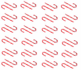 Christmas candy cane pattern on blue white background. Flat lay and top view