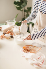 Kitchen mixer whipped cream custard pastry whisk rotates rapidly