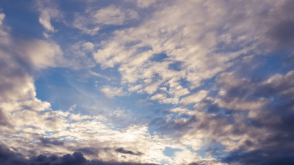 Naklejka na ściany i meble The vast blue sky and clouds sky in the sunset