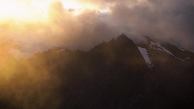 Mist in the mountains during sunset. Mysterious atmosphere. From &Oslash;rsta, Norway.