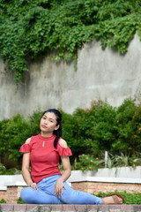 Naklejka premium A Cute Diverse Female Sitting