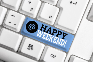 Text sign showing Happy Weekend. Business photo showcasing something nice has happened or they feel satisfied with life White pc keyboard with empty note paper above white background key copy space