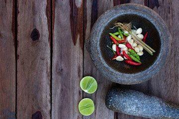 ingredient in mortar prepare seafood sauce on table wood copyspace texture advertising restuarant