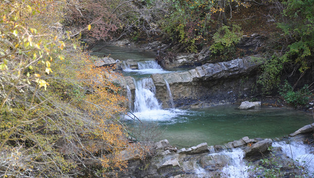 Waterfall Izumrudnyy (Emerald) and Chasha Lyubvi (Bowl of Love) in the Zhane River Valley. Krasnodar region, Russia