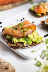Rye bread, smoked salmon, cucumber and microgreens