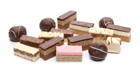 Traditional sweet pastries, cakes pile isolated on white background