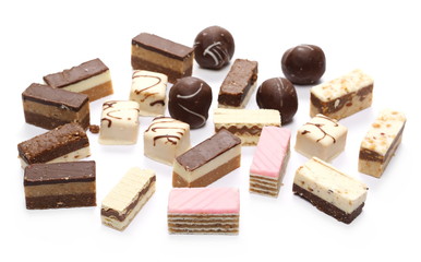 Traditional sweet pastries, cakes pile isolated on white background