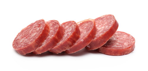 Fermented semi-dry, smoked sausage salami slices isolated on white background