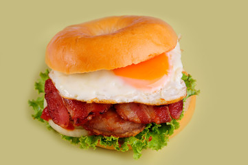 fresh tasty burger isolated on yellow background