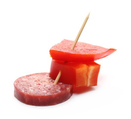 Fermented semi-dry, smoked sausage salami with tomato slice, isolated on white background