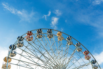 colourful of ferris wheel on blue sky,