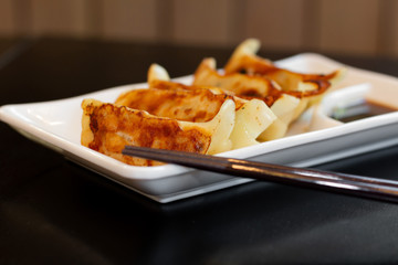Japanese gyoza or dumplings snack with soy sauce