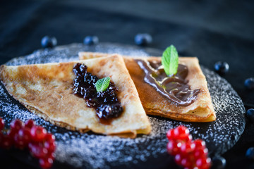 delicious home made pancakes with fresh fruits & chocolate