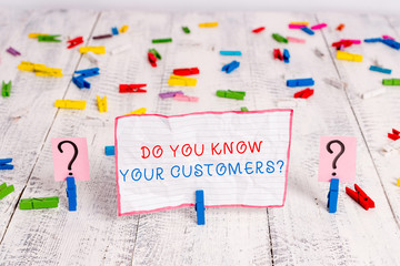 Handwriting text writing Do You Know Your Customers question. Conceptual photo asking to identify a customer s is nature Scribbled and crumbling sheet with paper clips placed on the wooden table