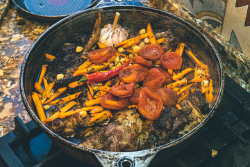 Home cooking of traditional uzbek food, pilau