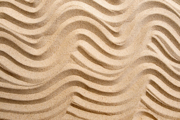 Fototapeta na wymiar Texture line wave sand on the beach, nature background, top view