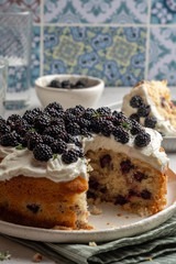 Fresh cakes with blackberries and cream cheese