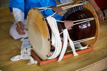 A person who plays samulnori, a traditional Korean music