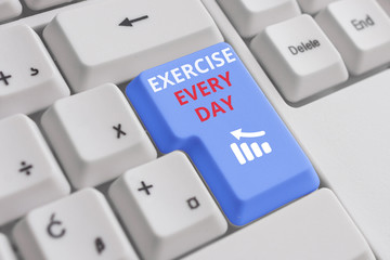 Conceptual hand writing showing Exercise Every Day. Concept meaning move body energetically in order to get fit and healthy White pc keyboard with note paper above the white background