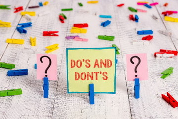 Handwriting text Do S And Dont S. Conceptual photo Rules or customs concerning some activity or...