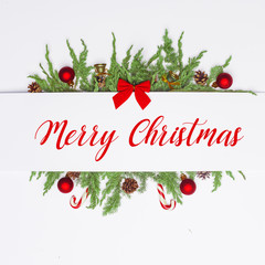 Christmas composition of coniferous branches, decorations and sweets. Flat lay. Top view Nature New Year concept. Copy space.