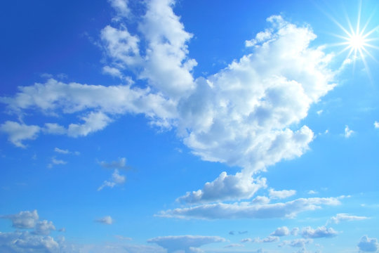 blue sky sun clouds texture