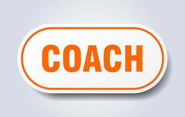 coach sign. coach rounded orange sticker. coach