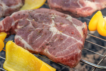 meat, steaks with grilled vegetables on the grill