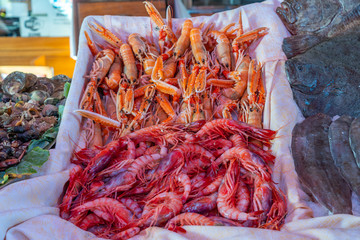 Colorful fresh caught shrimps and crawfish in seafood market