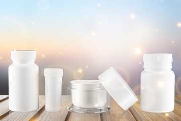 Cosmetic containers isolated on background
